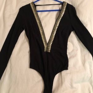 Black with gold trim bodysuit